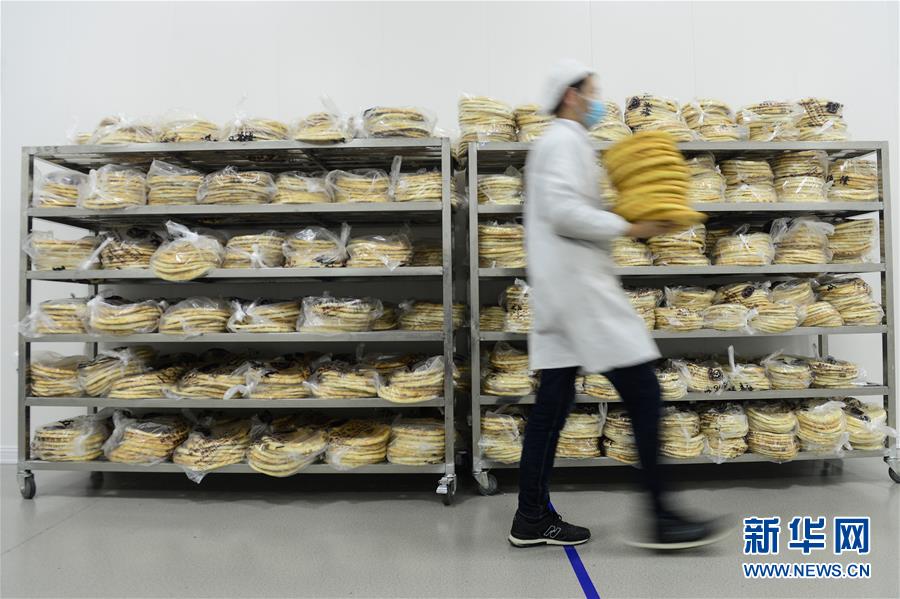 (經(jīng)濟)(3)小馕餅打造大產(chǎn)業(yè)